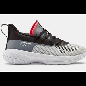 Under Armour Steph Curry 7 tennis shoes.